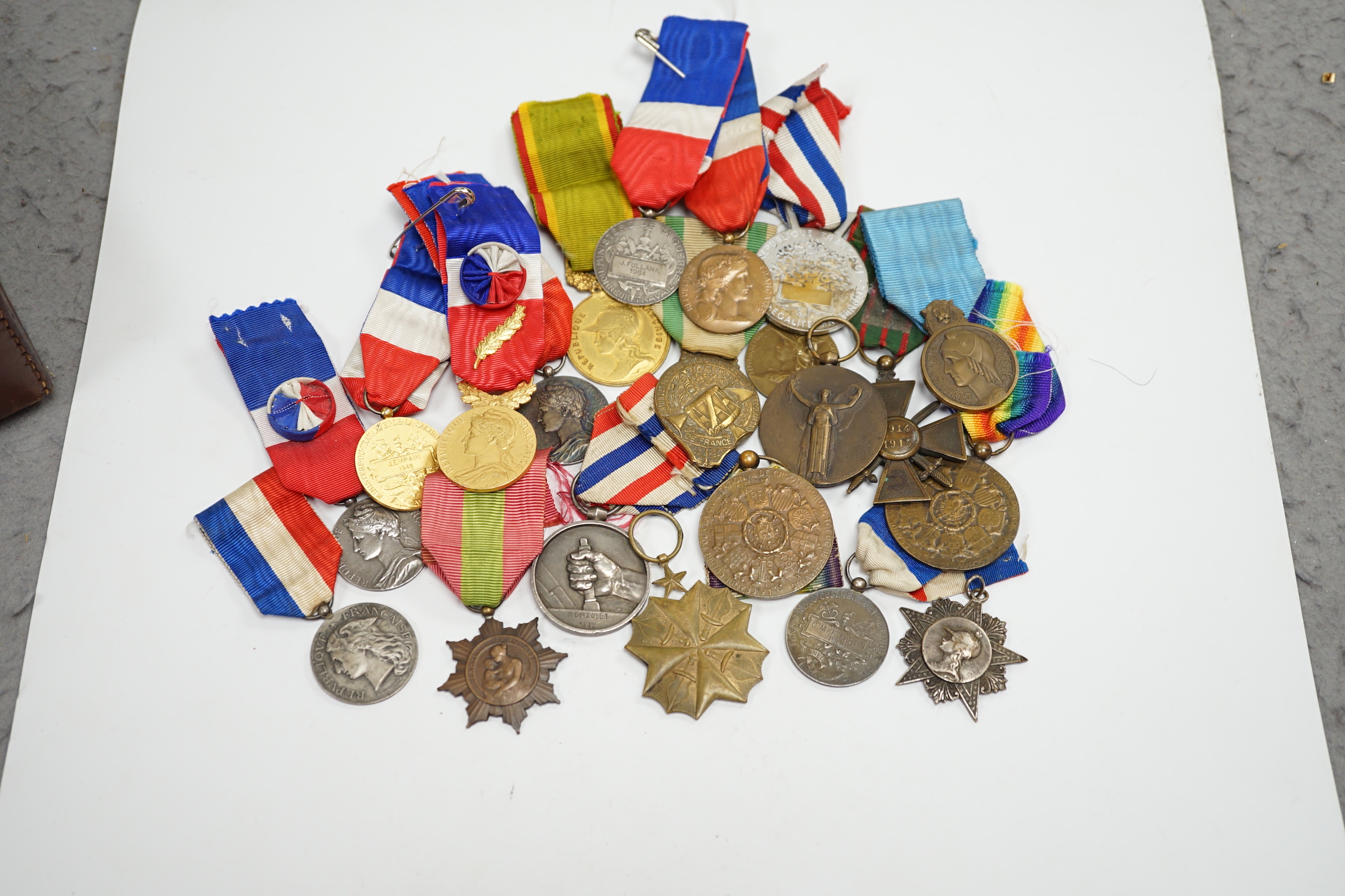 Eighteen French and Belgium medals, etc. including; Medal of Honour, War Cross, Medal of Honour for Physical Education, Victory Medal, etc.